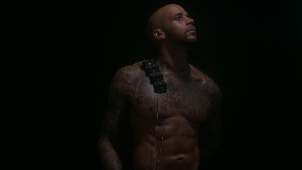 Man with back shaver back razor